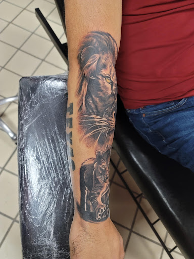 Explore faith tattoo ideas, creative tattoo ideas in Hereford, available at Slow Pain Tattoo Body Art Studio