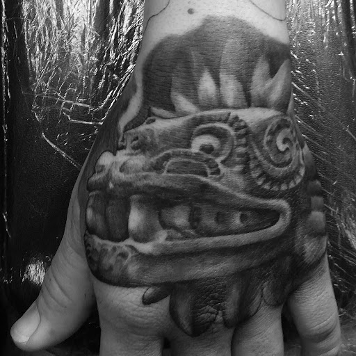 Explore pistol tattoo ideas, creative tattoo ideas in Hawthorne, available at Sinless Tattoo