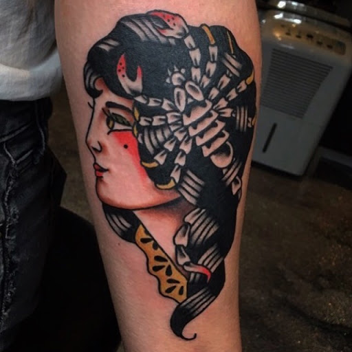 Explore the marathon continues tattoo ideas, creative tattoo ideas in Atlanta, available at Big Cat Tattoo