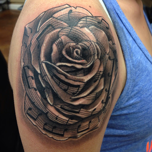 Explore tribal lion tattoo ideas, creative tattoo ideas in Lancaster, available at DEADMANS STUDIO