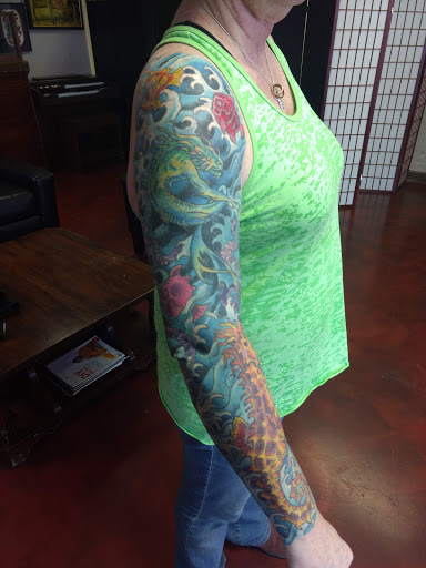 Explore horoscope tattoo ideas, creative tattoo ideas in Swannanoa, available at Iron Wolves Tattoo
