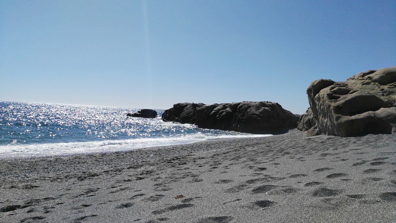 Foto de Calita Playa com pequena baía