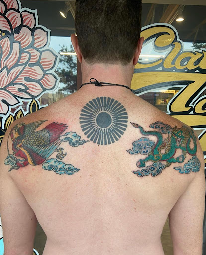 Find skull tattoo idea for your next unique tattoo in Boulder at Claw and Talon Tattoo