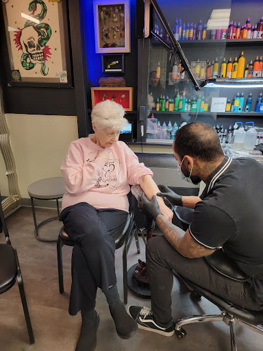 Explore pink tattoo ideas, creative tattoo ideas in Martins Ferry, available at Hot Rod Tattooing