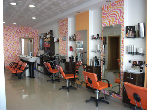 Información y opiniones sobre Peluquería Trihal de Badajoz