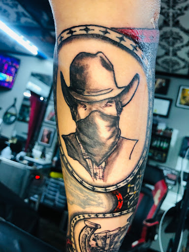 Explore mens tricep tattoo ideas, creative tattoo ideas in Wasilla, available at Doulos Tattoo, The Tattoo Shop
