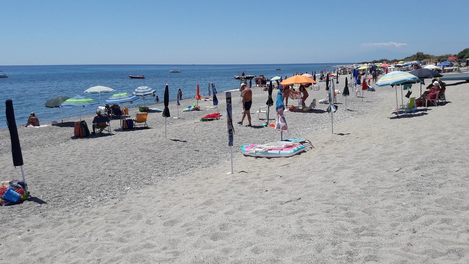 Φωτογραφία του Ultima Spiaggia II με γκρίζα άμμος επιφάνεια