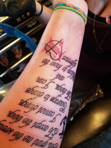 Explore name tattoo ideas arm, creative tattoo ideas in Stevens Point, available at Mothers Approval Tattooing