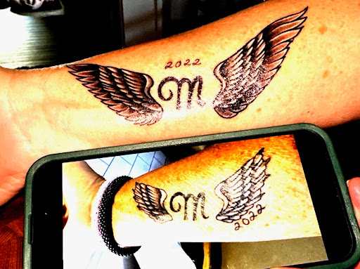 Find simple mom tattoo ideas for your next unique tattoo in Concord at Black Cloud Tattoo and Piercing