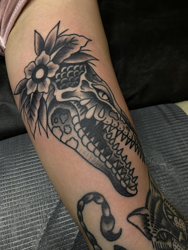 Explore sadness tattoo ideas, creative tattoo ideas in Fayetteville, available at Sovereign Tattoo Studio
