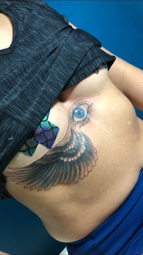 Explore tattoo ideas for a son, creative tattoo ideas in Buford, available at Wild Tribe Tattoos and Piercings
