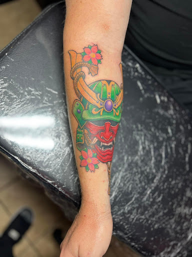 Explore hip thigh tattoo ideas, creative tattoo ideas in Warner Robins, available at Untold Pain Tattoo Studio