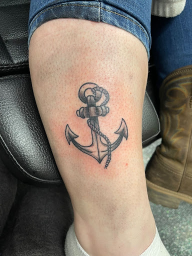 Explore haunted house tattoo ideas, creative tattoo ideas in Slippery Rock, available at Dinky Dachshund Tattoo Parlor