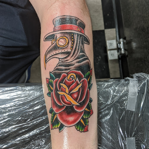 Explore candy skull tattoo ideas, creative tattoo ideas in New Bern, available at Ol Skool Tattoos
