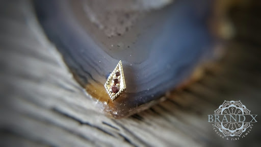 Explore dice tattoo ideas, creative tattoo ideas in Longview, available at Brand X Piercing & Fine Jewelry