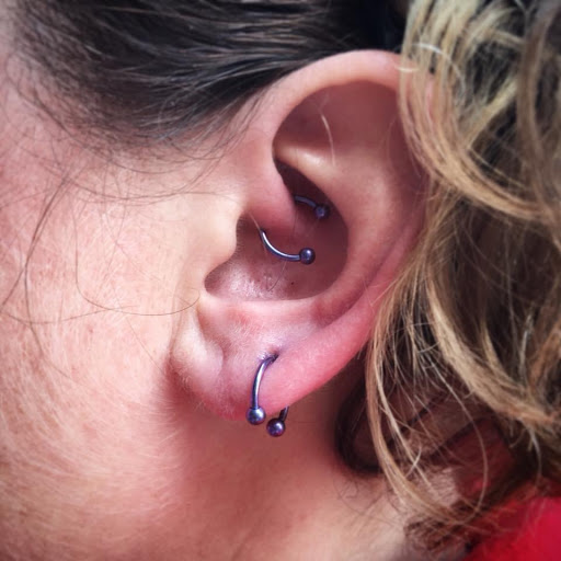 Explore tattoo ideas for epilepsy, creative tattoo ideas in Louisburg, available at Purple Dot Piercings