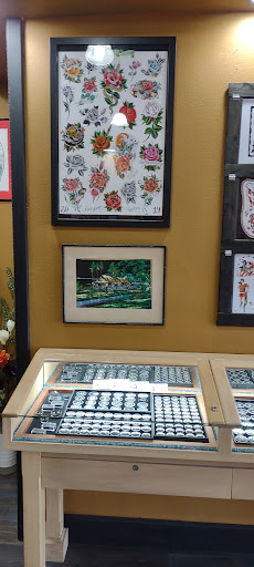 Explore tattoo ideas for photographers, creative tattoo ideas in Lake George, available at Lake George Tattoo Company