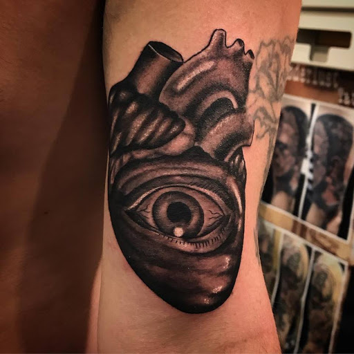 Explore lower arm half sleeve tattoo ideas, creative tattoo ideas in Amherst, available at Wanderlust Tattoo & Piercing