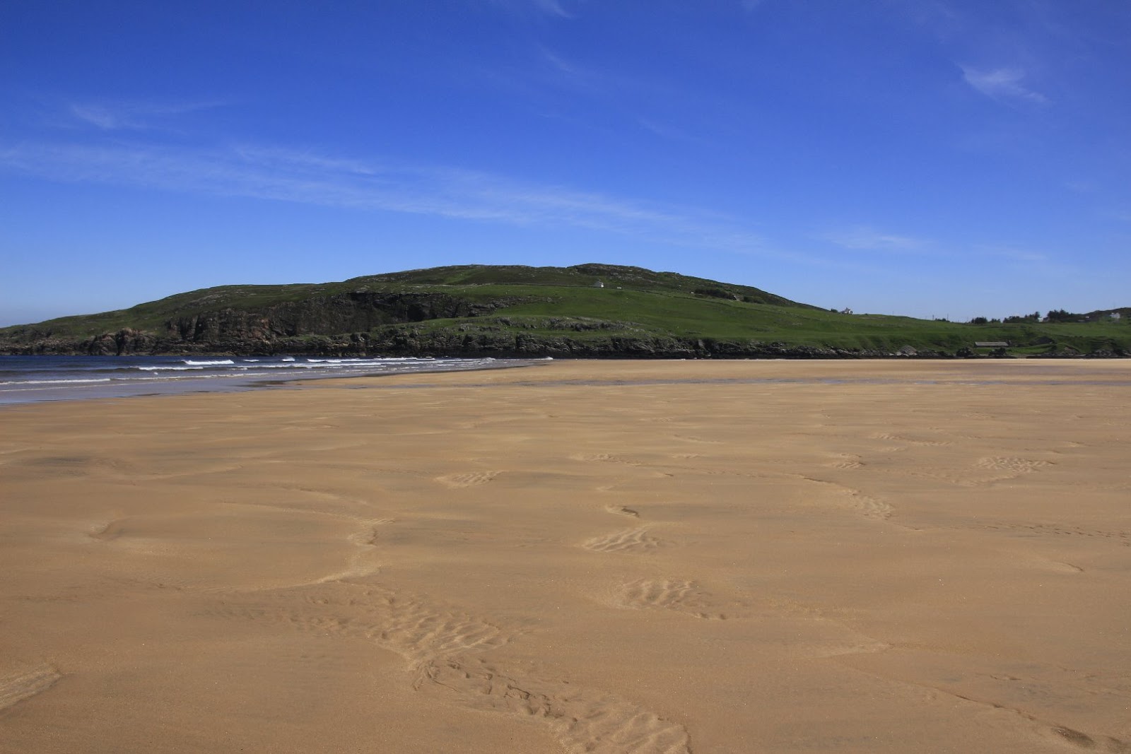Photo of Torrisdale beach with turquoise pure water surface