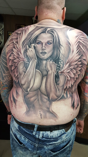 Explore tattoo ideas for a son, creative tattoo ideas in Warren, available at Dark Horse Tattoo Co. LLC.