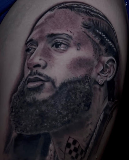 Explore mom son tattoo ideas, creative tattoo ideas in Arcadia, available at Mezink Tattoo