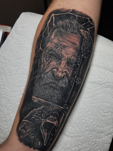 Explore fourth wing tattoo ideas, creative tattoo ideas in Lakeview, available at Backwoods Tattoo Studio