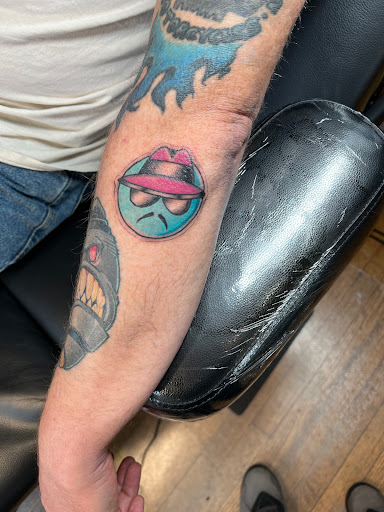 Find tattoo ideas under breast for your next unique tattoo in Canton at The Inkeepers Tattoo Parlor