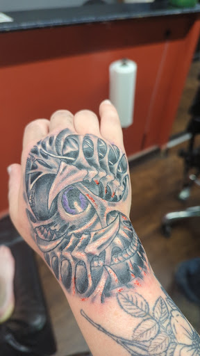 Explore goofy tattoos ideas, creative tattoo ideas in Clive, available at Wild Rose Tattoo & Piercing