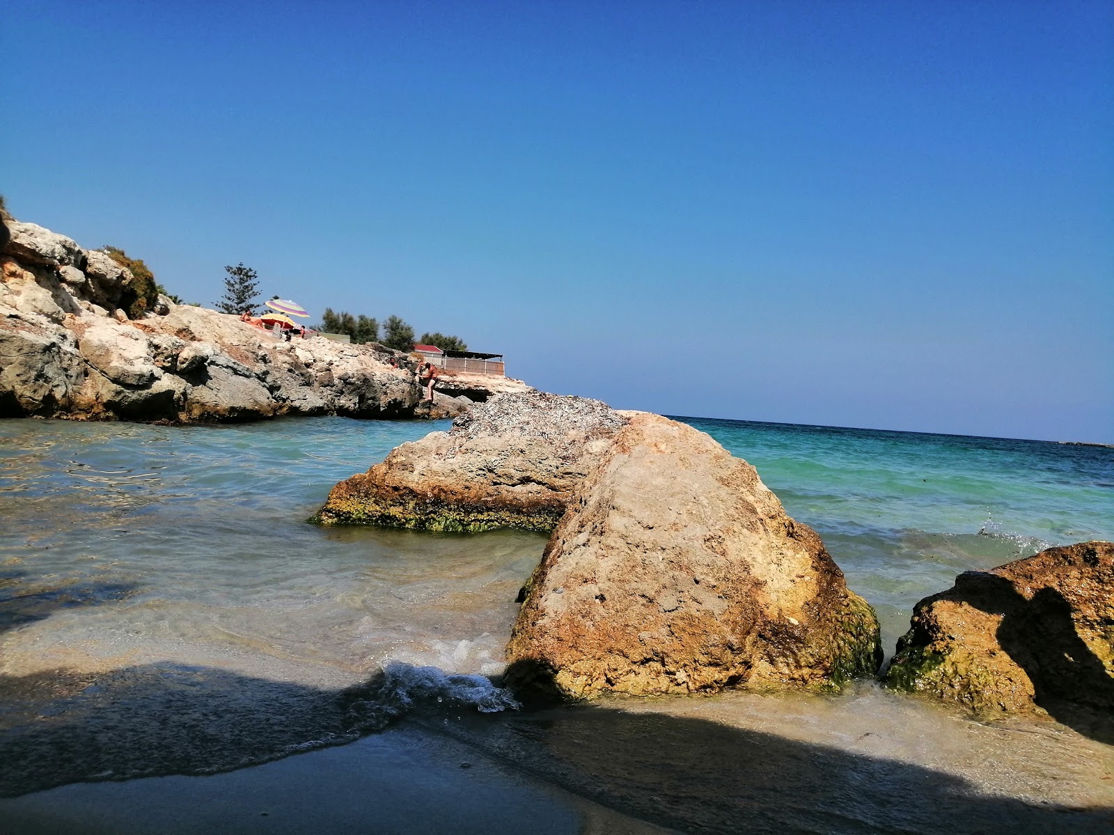 Foto av Ognina Beach med något ren nivå av renlighet