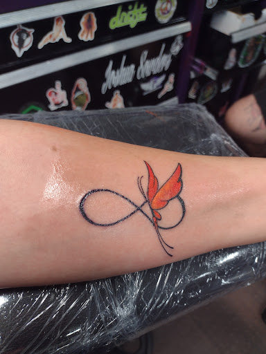 Explore ear tattoo ideas, creative tattoo ideas in Sullivan, available at Double Time Tattoo