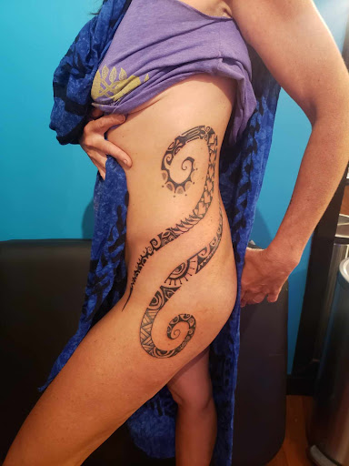 Explore tattoo ideas for guys back, creative tattoo ideas in Pahoa, available at Electric Jungle Tattoo