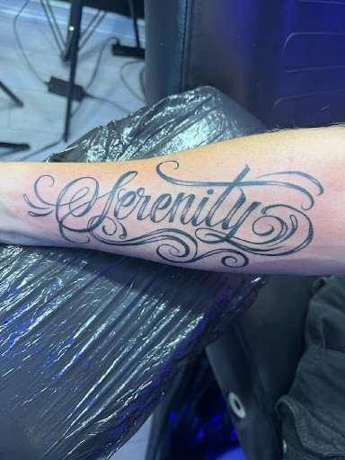 Explore son name tattoo ideas, creative tattoo ideas in Greensboro, available at Cosmic Ink Tattoo Studio