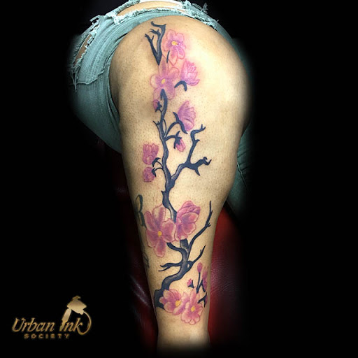 Find beach scene tattoo ideas for your next unique tattoo in Raleigh at Urban Ink society