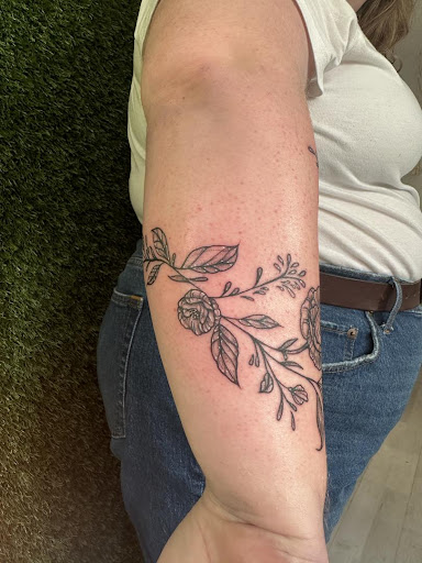 Explore christian tattoo ideas for females, creative tattoo ideas in Cocoa, available at Rorschach Tattoo Shop and Piercing Studio