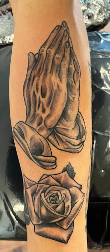 Explore dog collar tattoo ideas, creative tattoo ideas in Rogers, available at Ink Solutions Tattoo