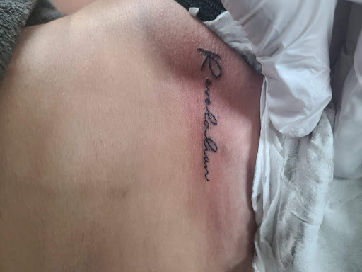 Explore black rose tattoo cover up ideas, creative tattoo ideas in San Angelo, available at Alchemy Tattoo and Piercing Studio