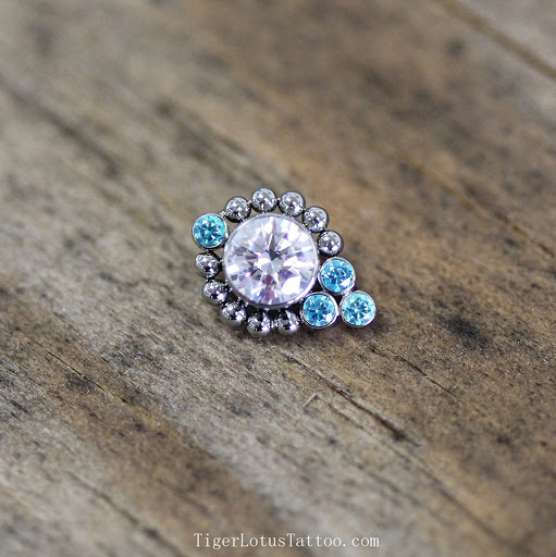 Explore skull tattoo ideas for guys, creative tattoo ideas in Fort Myers, available at Tiger Lotus Tattoo and Piercing