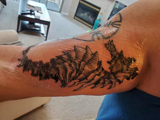 Explore men's fine line tattoo ideas, creative tattoo ideas in Mesa, available at Sea of Ink Tattoo Studio