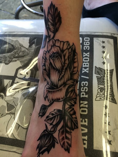 Explore pinterest flower tattoo ideas, creative tattoo ideas in Muncie, available at The Tattoo Studio