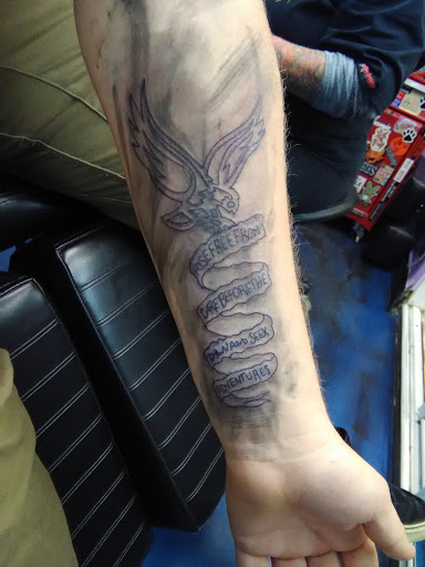 Tattoo Shop «Liquid Tattoo», reviews and photos, 16583 Old U.S. 27, Lansing, MI 48906, USA