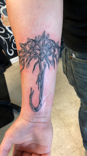 Explore uplifting tattoo ideas, creative tattoo ideas in Sanford, available at Hudson & Company Tattoo Studio