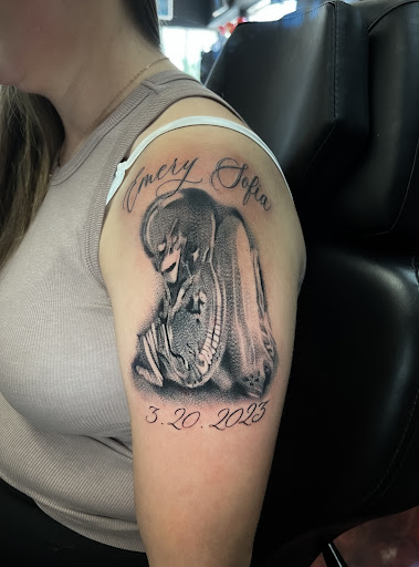 Explore lower back tattoo ideas for men, creative tattoo ideas in Silver City, available at Independent Ink Tattoo