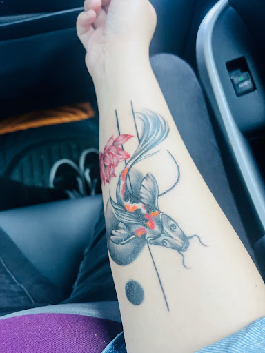 Explore we the people tattoo ideas, creative tattoo ideas in Orange, available at Ink Activitiez Tattoo