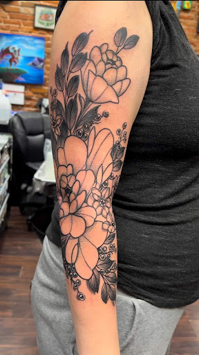 Explore tattoo sleeve fill in ideas, creative tattoo ideas in Dubuque, available at The Crows Nest
