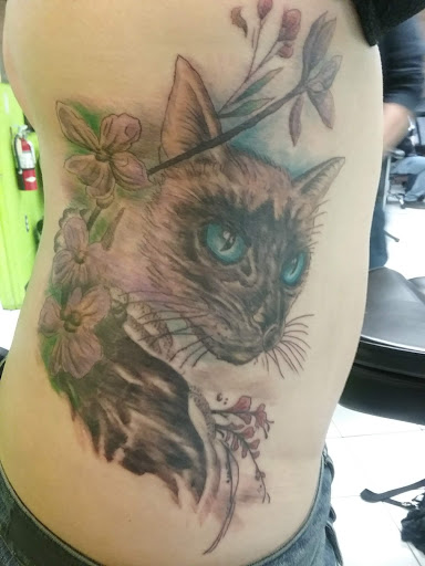 Explore rose tattoo cover up ideas, creative tattoo ideas in Walla Walla, available at Tatmandu