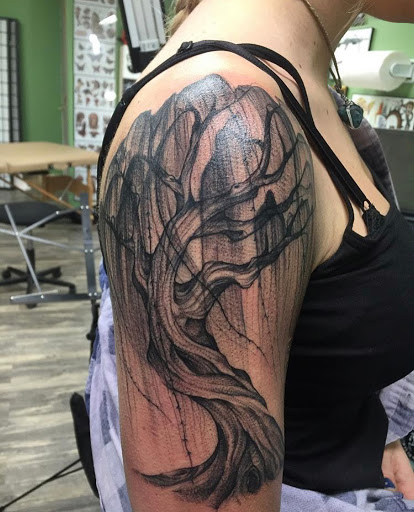 Explore back ear tattoo ideas, creative tattoo ideas in Campbellsville, available at Green River Tattoo Company