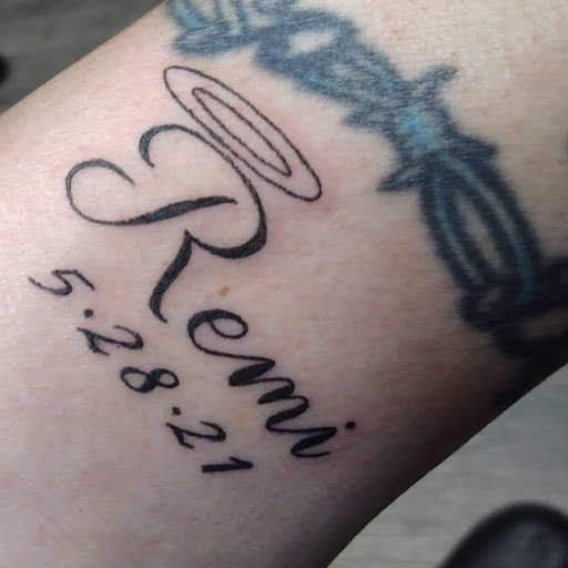 Explore february tattoo ideas, creative tattoo ideas in Belleville, available at Rock City Tattoos & Body Piercing