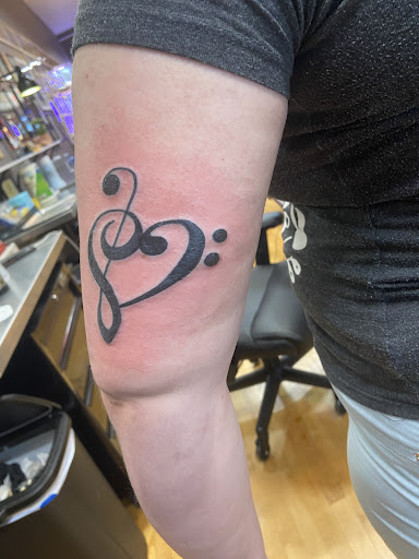 Explore cool face tattoo ideas, creative tattoo ideas in Muncie, available at Fox & Sparrow Tattoo