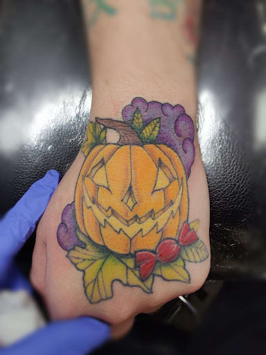 Explore gay pride tattoo ideas, creative tattoo ideas in Denver, available at Dreamscape Piercing and Tattoo LLC