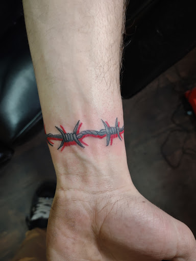 Find girl tattoos ideas for your next unique tattoo in Williamston at Inkd Tattoo Parlor